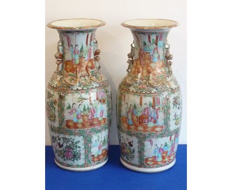 A pair of large 19th Century Chinese Canton porcelain Vases, each with two handles modelled as Karashishi and cub and each wi