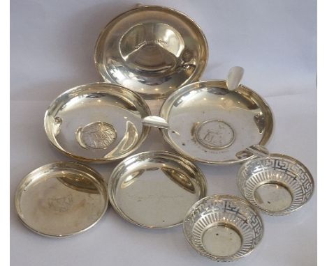 A selection of small white metal Dishes etc., to include an Ashtray set with a mid-20th century Portuguese coin (engraved '19