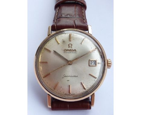 A gentleman's Omega Seamaster Dress Watch with automatic mechanical movement, the mother of pearl colour dial with baton mark