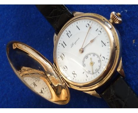 An unusual early 20th Century yellow gold (fully cased) Wristwatch, the engine turned engraved dial cover with vacant cartouc