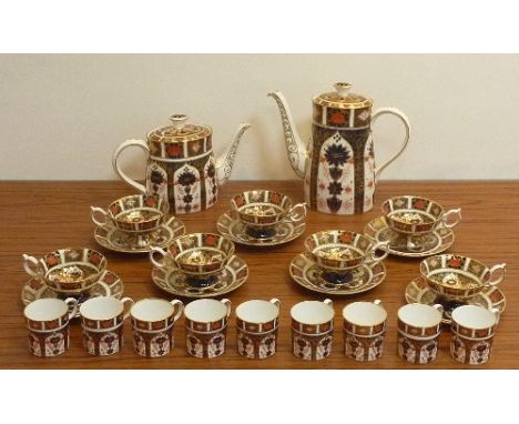 A Royal Crown Derby Tea/Coffee Service hand gilded and decorated in the 1128 Imari pattern, comprising lidded Teapot, lidded 