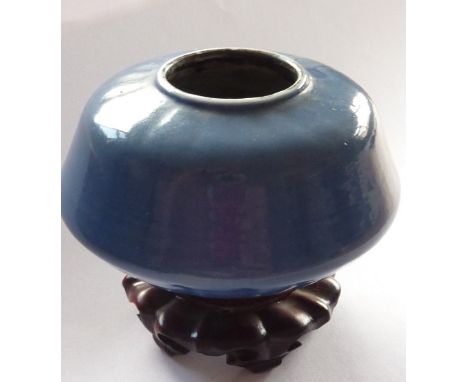 A circular Chinese porcelain Brush Washer, turquoise-blue ground and four-character mark to underside, 7cm diameter, together