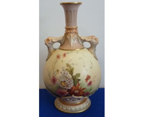 A Royal Worcester two-handled blush porcelain Vase beautifully decorated in enamels with floral sprays above a circular foot 