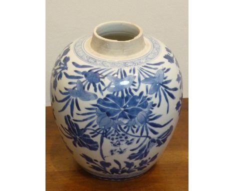 A Kangxi style Chinese porcelain ovoid shaped Vase decorated in cobalt blue with flowers/peony etc., (probably 19th/20th Cent