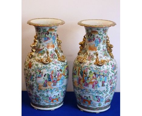 A pair of 19th Century Chinese Canton porcelain Vases, the two gilded handles as Karashishi and cubs playing with brocade bal