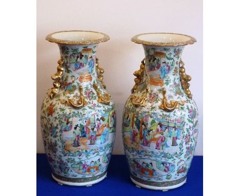 A pair of 19th Century Chinese Canton porcelain Vases, the two gilded handles as Karashishi and cubs playing with brocade bal