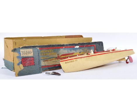 An original vintage circa 1930's Hornby tinplate clockwork speed boat model No. 35160 ' Racing Boat No.3 '. Retaining the ori