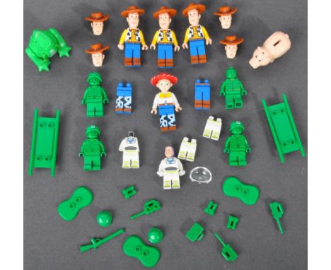 Lego Minifigures - Lego Toy Story - a collection of assorted original Lego Toy Story minifigures to include Woody (x3), Jessi