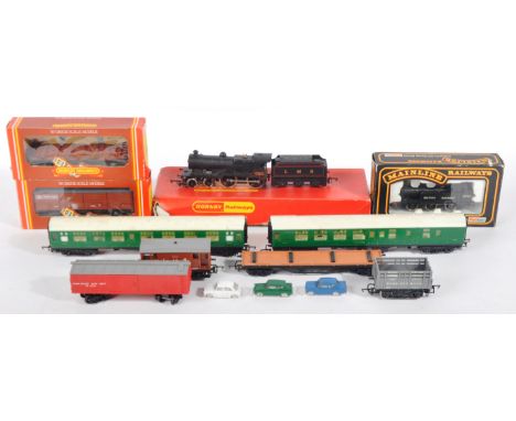 A collection of assorted Hornby, Tri-ang and Palitoy Mainline 00 gauge model railway trainset locomotives and rolling stock c
