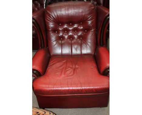 RED BUTTON BACKED THREE PIECE SUITE
comprising two armchairs and a matching settee