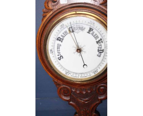 EARLY 20TH CENTURY CARVED OAK BAROMETER
89.5cm long 