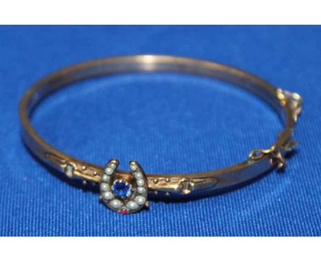 VICTORIAN PEARL AND GEM SET BANGLE
of horseshoe design, unmarked