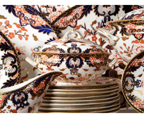 A Royal Crown Derby Porcelain and Earthenware Dinner Service, circa 1886, decorated with the King's Imari pattern, comprising