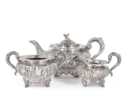 An Unusual Early Victorian Irish Silver Three Piece Tea Service, R W Smith, Dublin, 1838, of squat circular form, profusely d