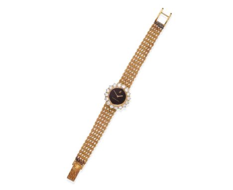 A Lady's 18ct Gold Diamond Set Wristwatch, signed Audemars Piguet, circa 1980, lever movement, black dial signed, diamond set
