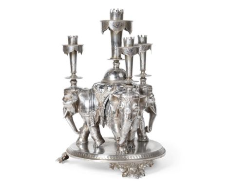 An Electroplated Table Centrepiece, apparently unmarked, late 19th century, modelled as three conjoined Indian elephants supp