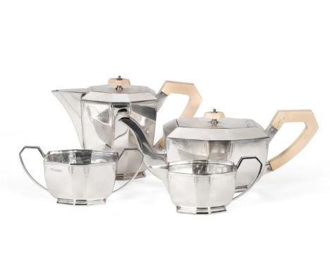 An Art Deco Silver Four Piece Tea Service, Viners Ltd, Sheffield 1954, of panelled oval form and with engraved decoration to 