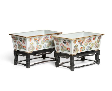 A Pair of Chinese Porcelain Jardinières, 19th century, of flared rectangular form, painted in famille rose enamels with vario