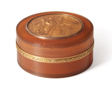 A French Blonde Tortoiseshell Snuff Box, circa 1790, circular with pull-off cover and two colour gold foliate mount, the cove