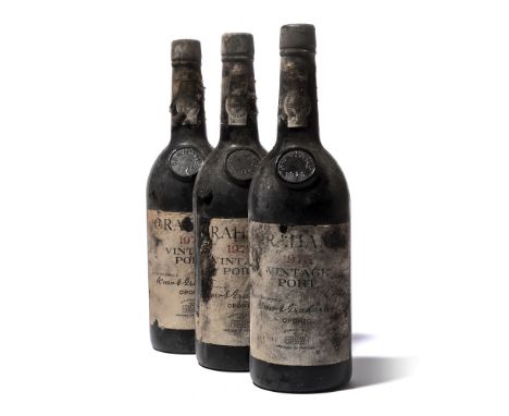 12 bottles Graham 1975 Douro Slightly corroded capsules. Bin-soiled and damaged labels, one missing part of label. Level base