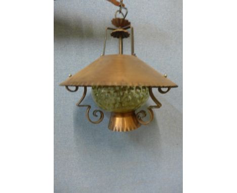 An Arts and Crafts copper hanging pendant ceiling light 