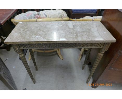 An Italian style gilt and marble topped console table 