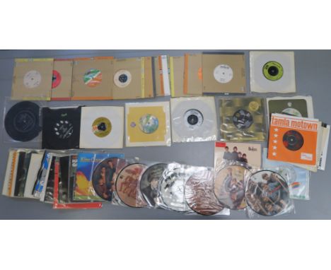 50+7 inch singles including the Beatles picture discs- Daytripper RP5 389, RP 5114, from me to you RP 5015, please please me 