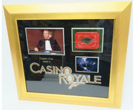 Casino Royale (2006) screen used prop $500,000 red Casino Plaque (3" x 4.24") as used in the film with a photo of Daniel Crai