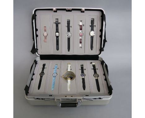 James Bond SWATCH watch collection made in limited numbers complete with original aluminium hard case and twenty original unu