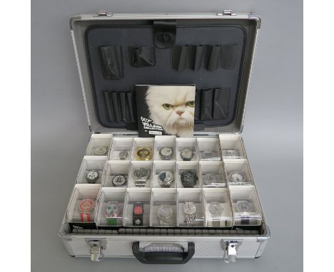 James Bond SWATCH "007 Villain collection" aluminium case containing 21 SWATCH watches all individually packaged in display b