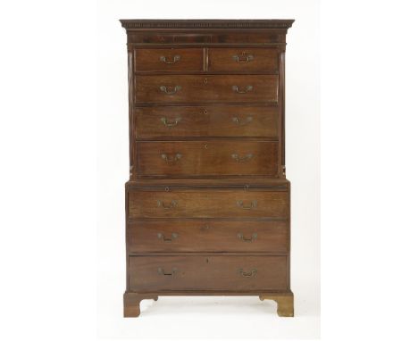 A George III mahogany chest on chest,the top section with fluted and canted corners, raised on bracket feet,110cm wide52.5cm 