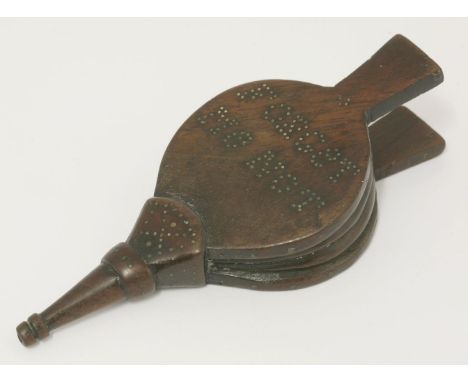 A novelty treen snuff box,in the form of a pair of bellows, early 19th century, with studwork decoration and 'Forget me not',