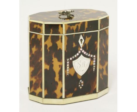 A George III tortoiseshell and ivory tea caddy,the cover inset with mother-of-pearl in a star motif, the front with a white m