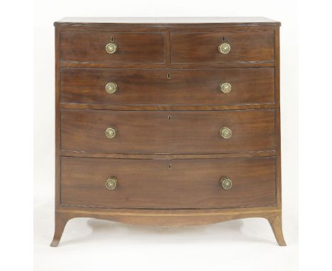 A George III mahogany bow front chest,the crossbanded top over two short and three long drawers, with brass knob handles and 