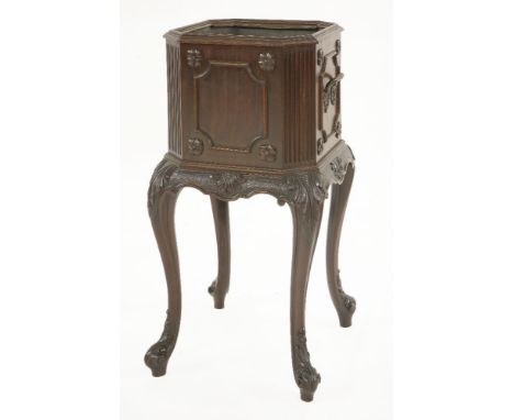 A mahogany Chippendale Revival planter,with fluted and canted corners, raised on cabriole legs, brass carrying handles,22.5cm