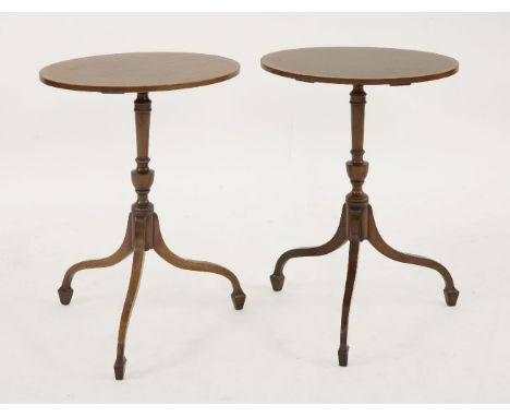 A pair of George III-style mahogany and crossbanded oval occasional tables,by Arthur Brett, standing on turned supports and t
