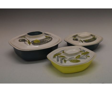 Three retro design Poole pottery dishes and covers, each with printed vegetable decoration, largest 29.5cm wide (3)  