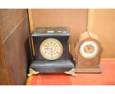 Early 20th Century inlaid oak mantel clock, 27cm high, together with an American ebonised mantel clock imitating black slate 