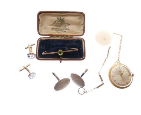 Yellow metal bar brooch set peridot-coloured green stone, pair of Masonic cufflinks, gilt metal pendant watch and an unmounte