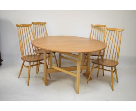 Ercol Golden Dawn elm drop-leaf 'Sutherland' table, 21cm wide (closed, 139cm open x 127cm x 71cm high, together with four Erc