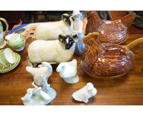 Assorted ceramics to include; Nao, two Coopercraft rams, Hens on nests, etc (9)  