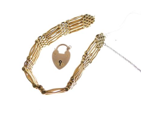 Yellow metal gate link bracelet stamped 9ct, with matching padlock, 23g approx, in original fitted box  