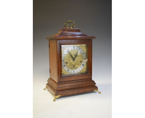 Reproduction Georgian-style mahogany bracket clock with three-train chiming movement striking on gong rods, 38cm high excludi