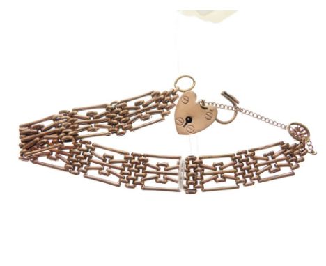Yellow metal gate-link bracelet with 9ct gold padlock, 23.8g approx  