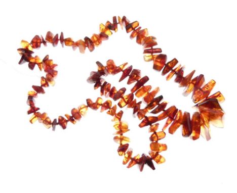 Tumbled amber necklace of irregular boulder design, largest pieces approximately 28mm wide, 86g  gross approx  