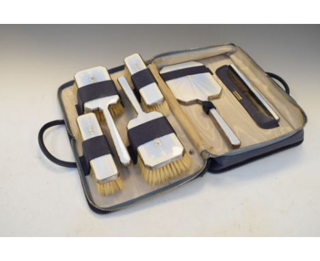 George VI silver and enamel dressing set comprising four brushes, mirror and comb having pale blue Art Deco enamel decoration