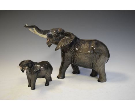 Two Beswick elephants - Elephant trunk stretching large No. 998, 26cm high and Smaller similar No. 974, 12cm high  