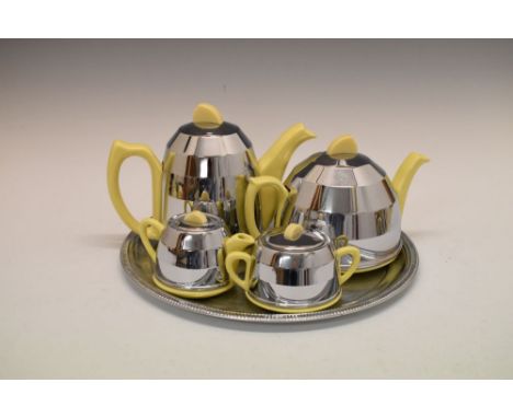 Retro ceramic tea service with chromed metal insulation covers, stamped beneath 877448, together with a plated tray (5)  