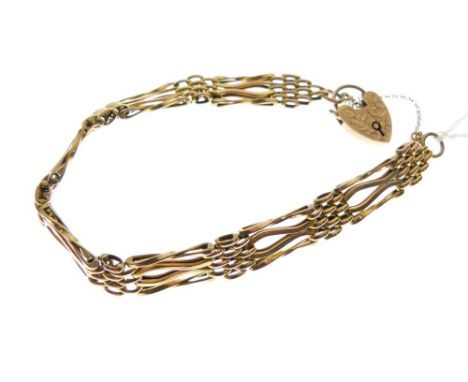 Yellow metal gate-link bracelet of textured design with engraved 9ct gold heart-shaped padlock, 6.9g  gross approx  