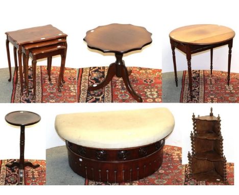 A group of furniture comprising, a mahogany Pembroke table, a nest of three tables, two further occasional tables, a hanging 